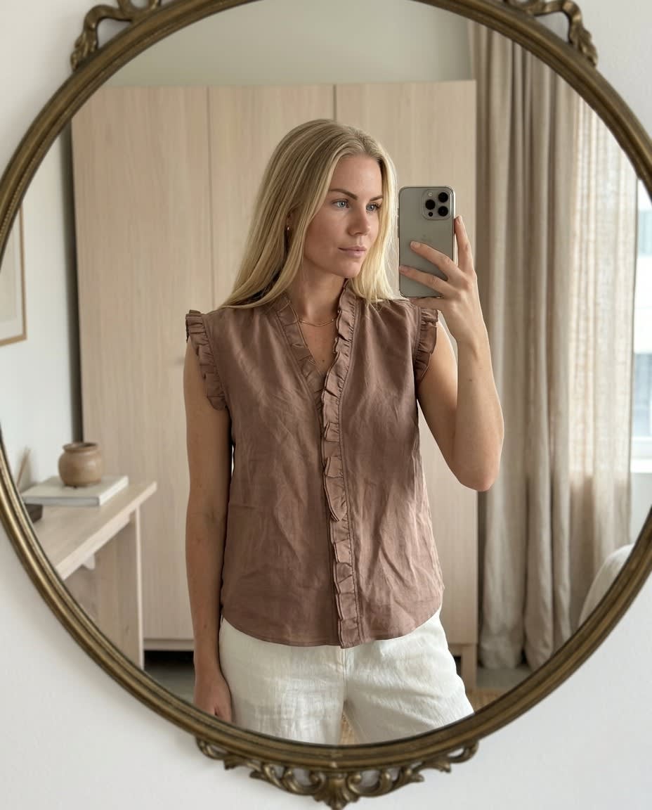 Ruffled Sleeveless Linen Blouse